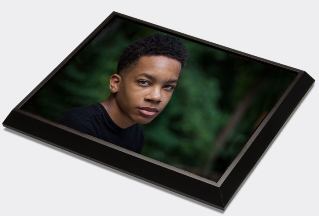 Image of a portrait in a floating frame