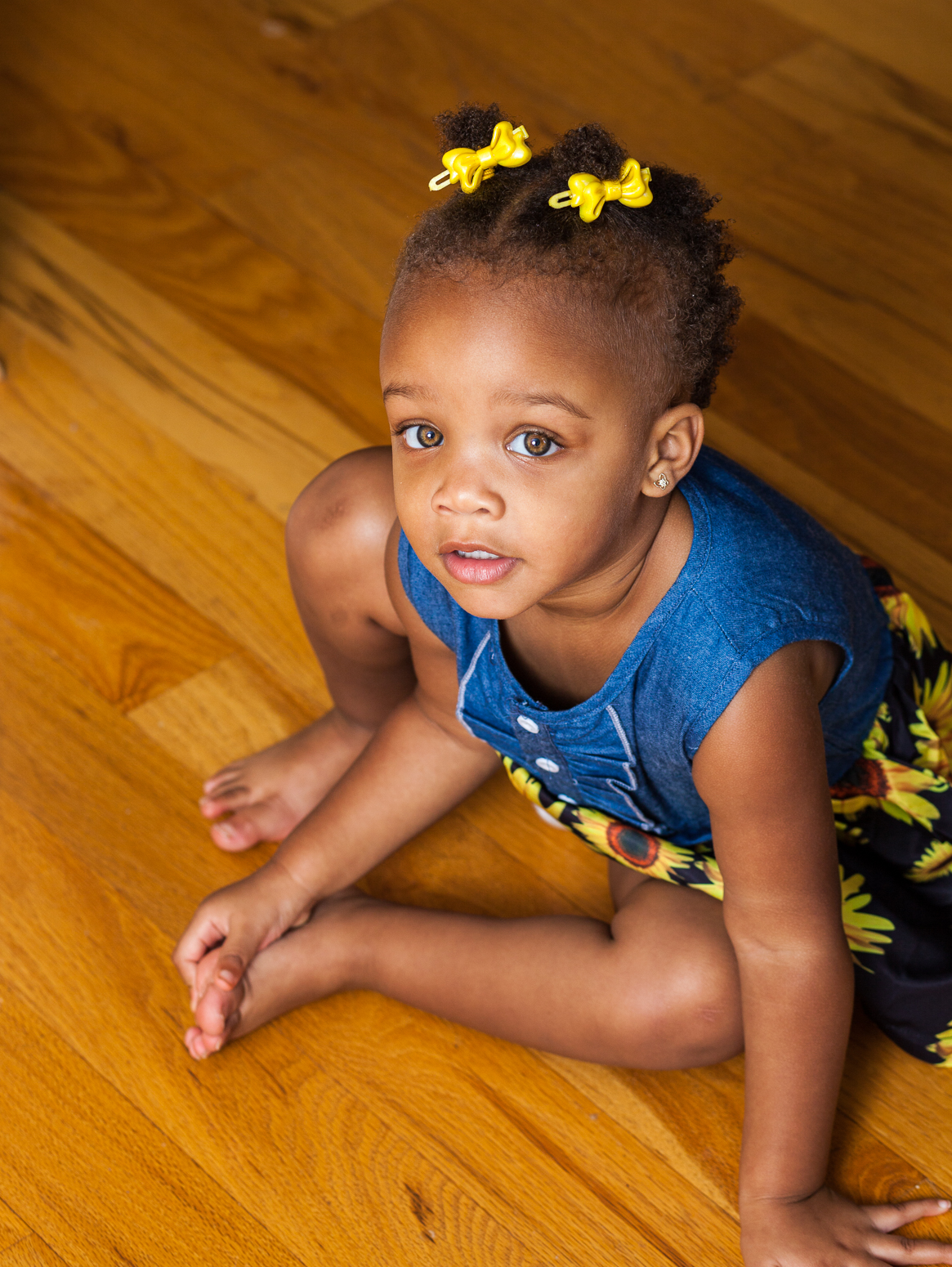 Toddler sitting on the floor